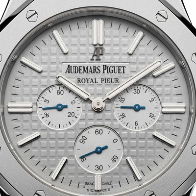 Close-up of an elegant Audemars Piguet Royal Oak watch face, showcasing intricate details and craftsmanship